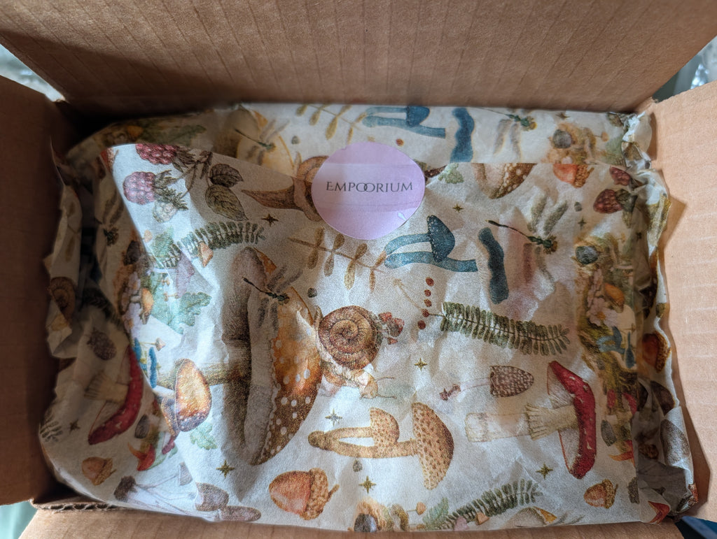 Empoorium Pin Your Own Bug Box kit wrapped in botanical tissue paper, ready to ship